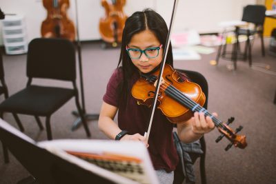 Middle School student playing violin