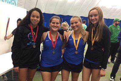 Four girls at tennis tournament