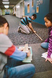 students working by the makerspace