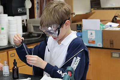 Lower Schooler in science classroom