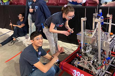 Robotics team with their robot