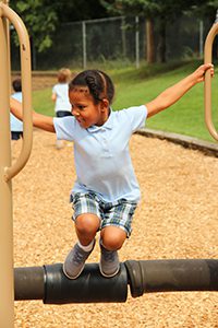 Lower schooler playing outside