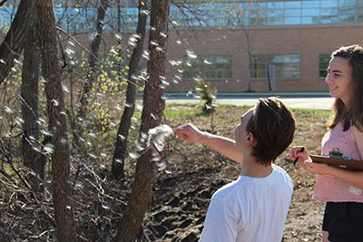 upper school students outside for biology class