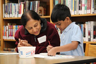 lower school with special friend in library 