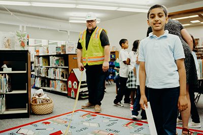 A&P measuring the library rug