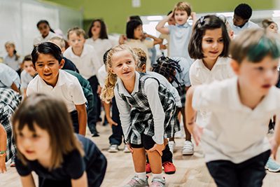 lower school warming up at the Monday morning meaning