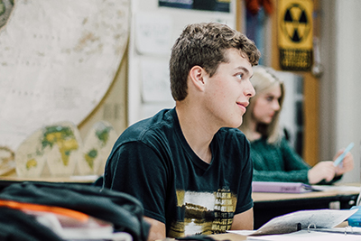 upper school student engaged in class