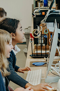 two third graders using the makerspace computer