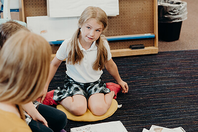 lower school student listening intently