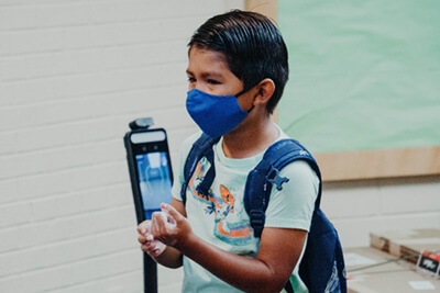 lower school student doing morning screening