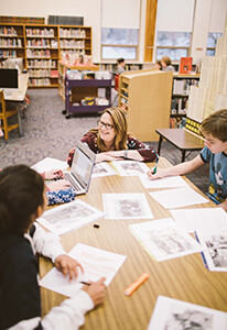 ms. dale helping one of her students