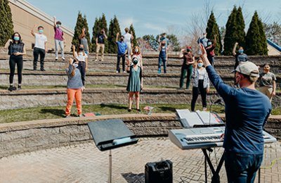 choir singing for the first time on campus this year