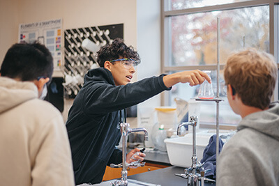 Upper School chemistry class in a lab