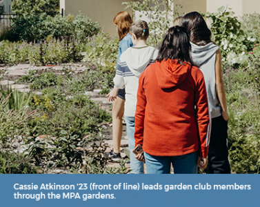 Cassie Atkinson '23 leads garden club members through the MPA gardens.